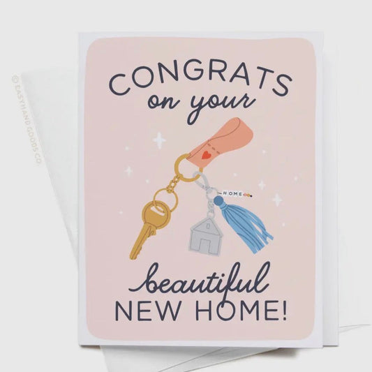 Greeting card with 'Congrats on your beautiful new home!' text and keychain illustration.