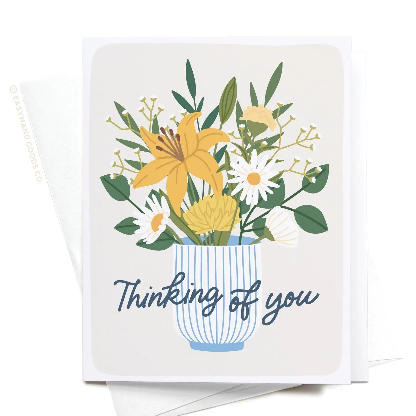 Greeting card with floral design and 'Thinking of you' text on a white background