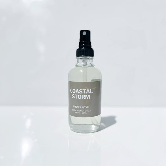 Room Spray Bottle of 'Coastal Storm' perfume on a white surface