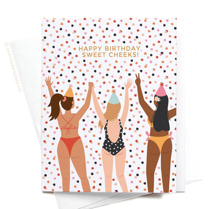 Birthday card with three women in swimsuits and party hats on a polka dot background.