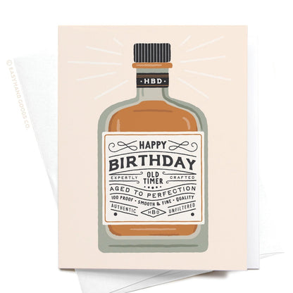 Birthday card with a bottle design and 'Happy Birthday' text on a beige background