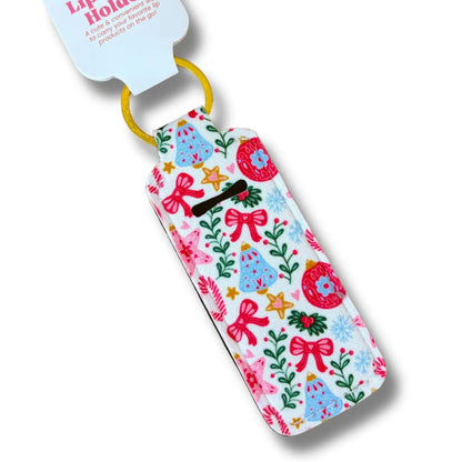 Lip balm holder with floral and bow pattern on a white background