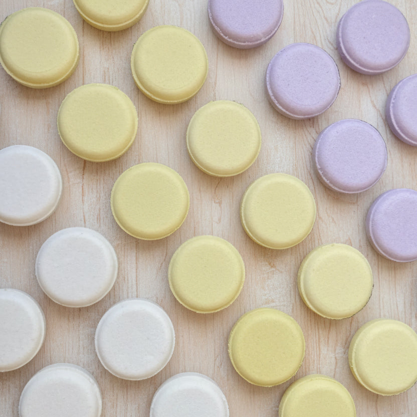 Shower Steamers laid out by scent on a wood background 
